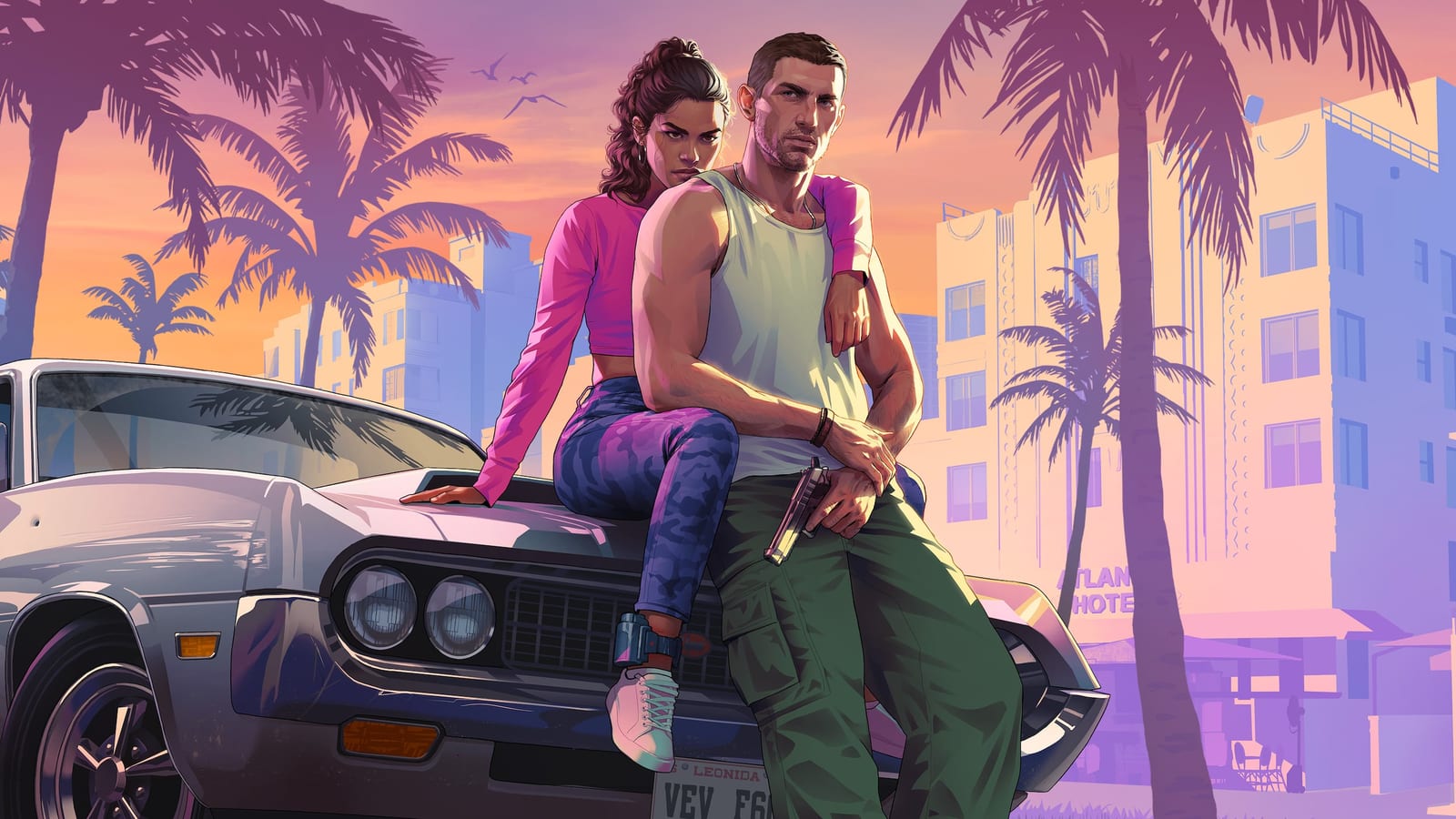 Official Grand Theft Auto VI key art: Lucia and Jason leaning against a muscle car on a Vice City street at sunset